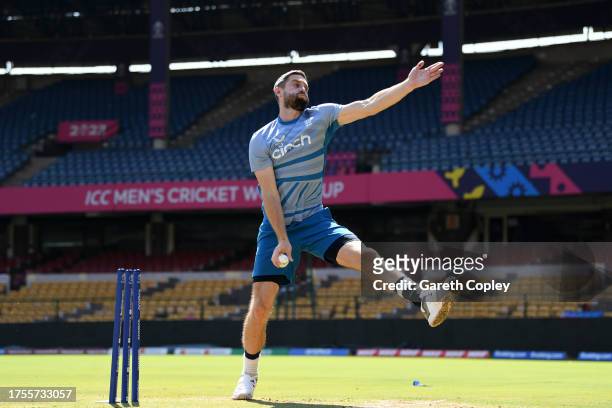 Chris Woakes of England bowls during nets session at Karnataka State Cricket Association Stadium on October 25, 2023 in Bangalore, India.