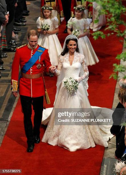 Britain's Prince William and his bride Kate, Duchess of Cambridge, leave Westminster Abbey in London on April 29 after their wedding ceremony. AFP...