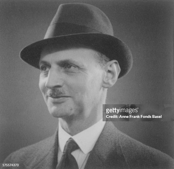 Headshot of Anne Frank's father, Otto Frank, wearing a hat.