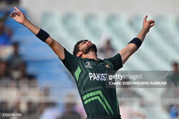 Pakistan's Shaheen Shah Afridi celebrates after taking the wicket of Bangladesh's Tanzid Hasan during the 2023 ICC Men's Cricket World Cup one-day...