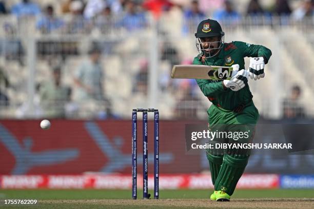 Bangladesh's Liton Das watches the ball after playing a shot during the 2023 ICC Men's Cricket World Cup one-day international match between Pakistan...