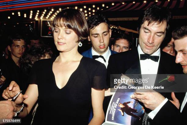 Actors Timothy Dalton and Carey Lowell attend the premiere of the James Bond film 'License to Kill' at the Odeon cinema on June 13, 1989 in London,...