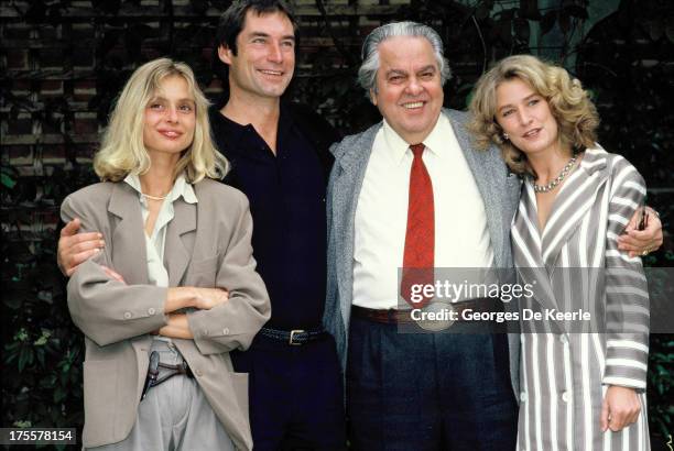 Actors Maryam d'Abo, Timothy Dalton, producer Albert 'Cubby' Broccoli and actress Caroline Bliss attend a photocall for the promotion of the James...