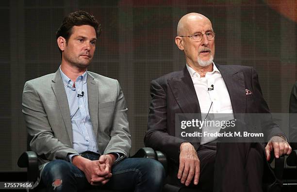 Actors Henry Thomas and James Cromwell speak onstage during the "Betrayal" panel discussion at the Disney/ABC Television Group portion of the...