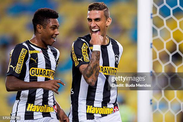 Rafael Marques and Vitinho of Botafogo celebrate a scored goal during the match between Vasco da Gama and Botafogo as part of Brazilian Championship...