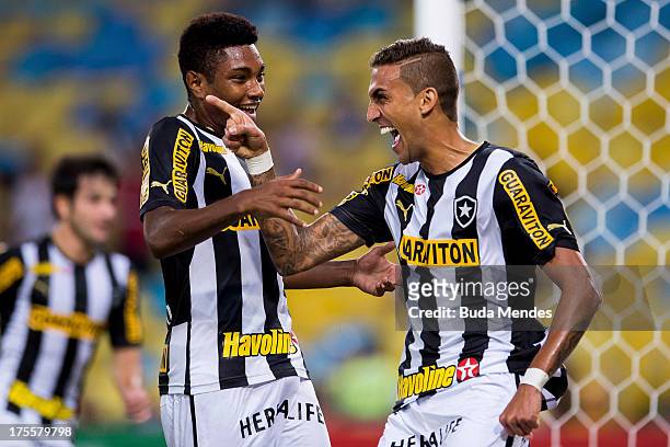 Rafael Marques and Vitinho of Botafogo celebrate a scored goal during the match between Vasco da Gama and Botafogo as part of Brazilian Championship...