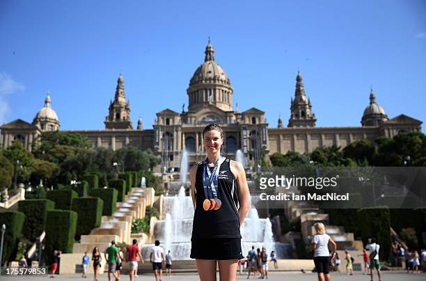 Lauren Boyle of New Zealand poses with her three Bronze medals from the 400m 800m and 1500m Freestyle, in front of The MNAC on day sixteen of the...