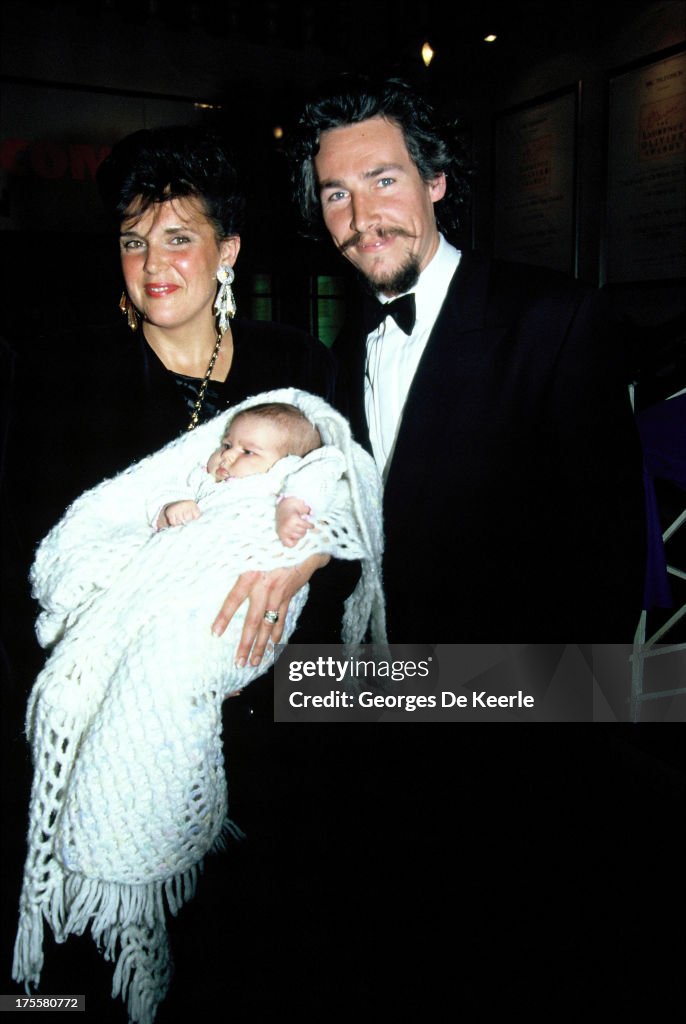 Simon Dutton Model Actor Simon Dutton and his wife Tamsin Olivier pose with their child ...