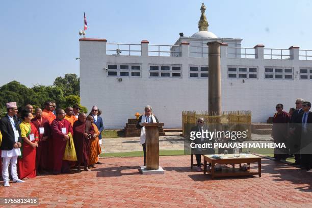 Nepal's Prime Minister Pushpa Kamal Dahal and United Nations Secretary General Antonio Guterres address the media during their visit to the Maya Devi...