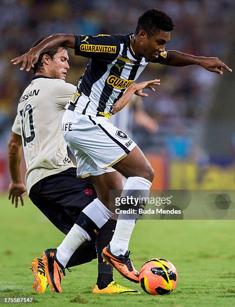 Pedro Ken of Vasco da Gama fights for the ball with a Vitinho of Botafogo during the match between Vasco da Gama and Botafogo as part of Brazilian...