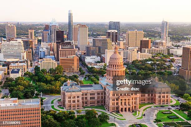 austin texas capitol building sunset aerial with downtown skyline background - austin texas sunset stock pictures, royalty-free photos & images