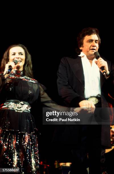 Johnny Cash with June Carter Cash performing at the Dane County Coliseum, Madison, Wisconsin, February 18, 1982.