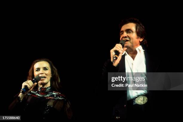 Johnny Cash with June Carter Cash performing at the Dane County Coliseum, Madison, Wisconsin, February 18, 1982.