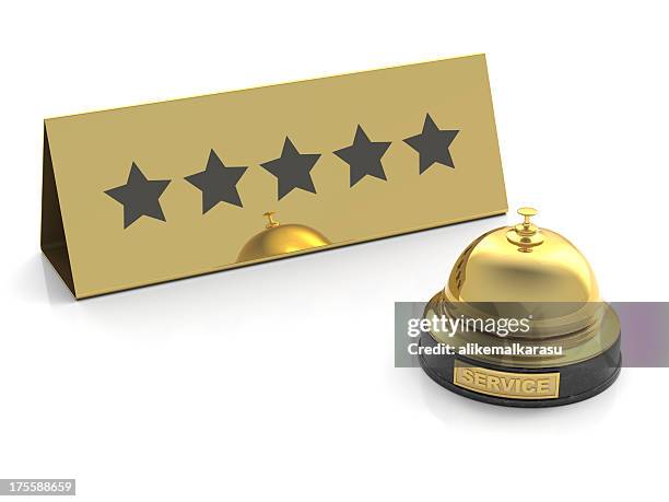 gold bell for five stars service on white - star hotel stock pictures, royalty-free photos & images