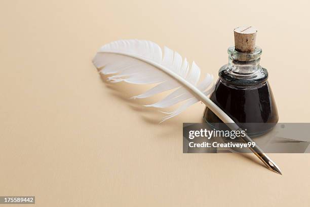 quill pen and ink bottle - feather quill stock pictures, royalty-free photos & images