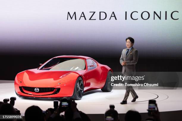 Mazda Motor Corp. CEO Masahiro Moro speaks next to the Mazda Iconic SP concept vehicles during the Japan Mobility Show at Tokyo Big Sight in Tokyo,...