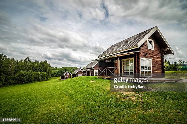 cozy bungalows - small village countryside stock pictures, royalty-free photos & images