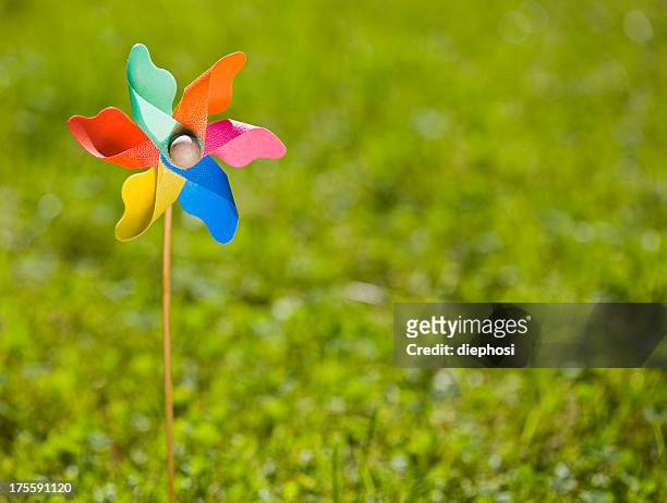 small and colorful - paper windmill stock pictures, royalty-free photos & images