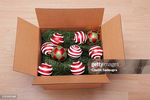 christmas ornaments in a box - cardboard box stock pictures, royalty-free photos & images