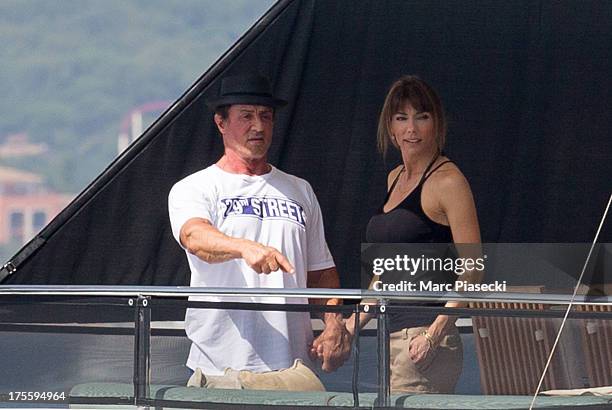 Sylvester Stallone and wife Jennifer Flavin are seen leaving the harbour of Saint Tropez on August 4, 2013 in Saint-Tropez, France.