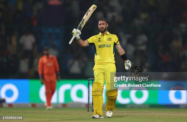 Glenn Maxwell of Australia celebrates their century during the ICC Men's Cricket World Cup India 2023 between Australia and Netherlands at Arun...