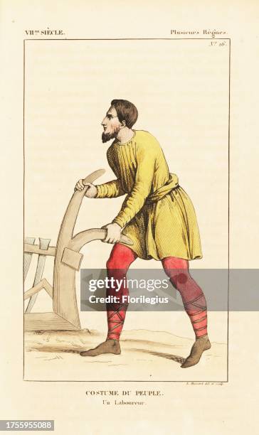 Costume of a farm labourer with plough, 12th century. He wears a short tunic over stockings, leather shoes with laces up the calf. Handcoloured...