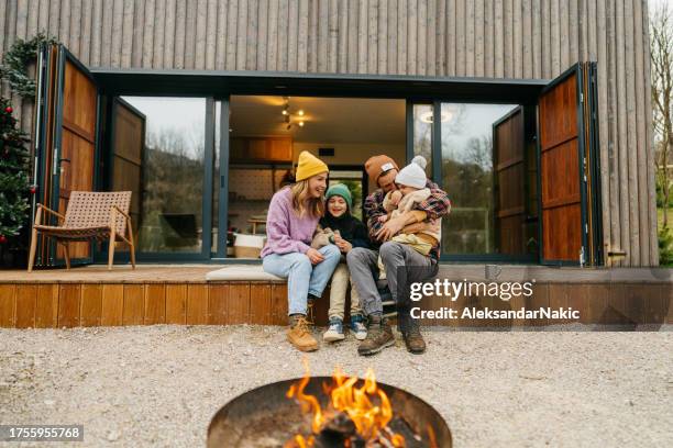 extended weekend in the cabin house - family winter stock pictures, royalty-free photos & images