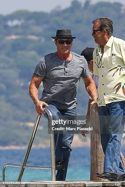 Sylvester Stallone is seen arriving at the 'Club 55' beach on August 4, 2013 in Saint-Tropez, France.