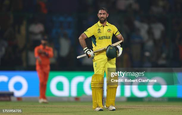 Glenn Maxwell of Australia celebrates their century during the ICC Men's Cricket World Cup India 2023 between Australia and Netherlands at Arun...