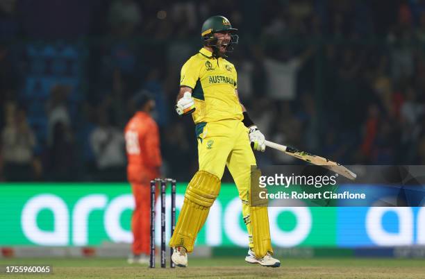 Glenn Maxwell of Australia celebrates their century during the ICC Men's Cricket World Cup India 2023 between Australia and Netherlands at Arun...