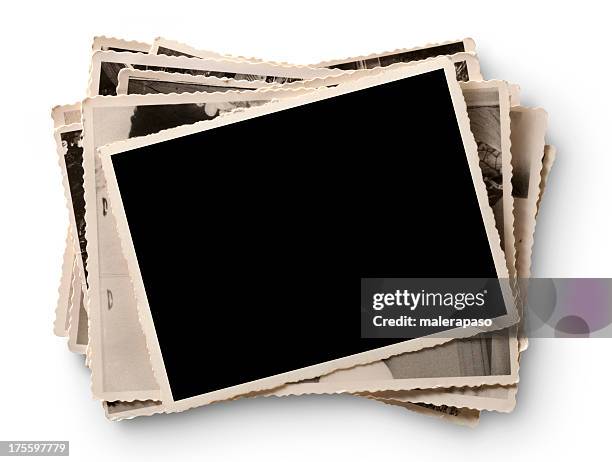 old photographs - pile of books white background stockfoto's en -beelden