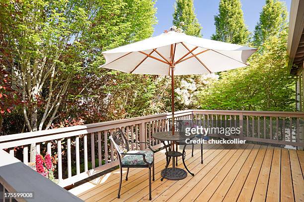 sunny second floor back deck with breakfast table - utedäck bildbanksfoton och bilder