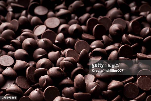 chocolate chip background - chocolate chips stock pictures, royalty-free photos & images