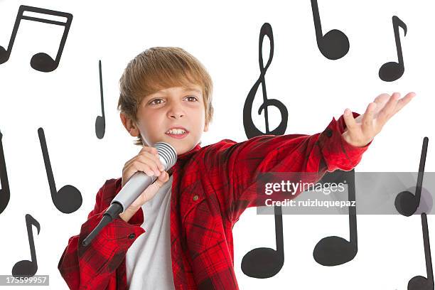 singen lustiger junge - boy singing stock-fotos und bilder