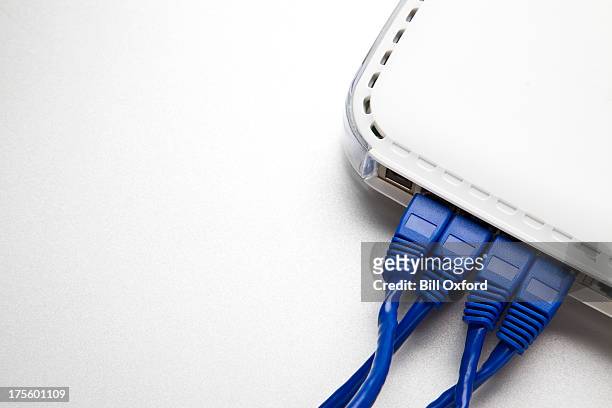 technology. connection. router - plugging in stockfoto's en -beelden