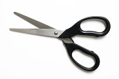 Isolated shot of opened black handle scissors on white background