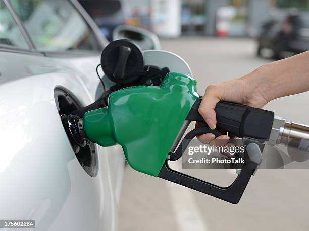 car refueling - xxxxxlarge - premium gasoline stock pictures, royalty-free photos & images