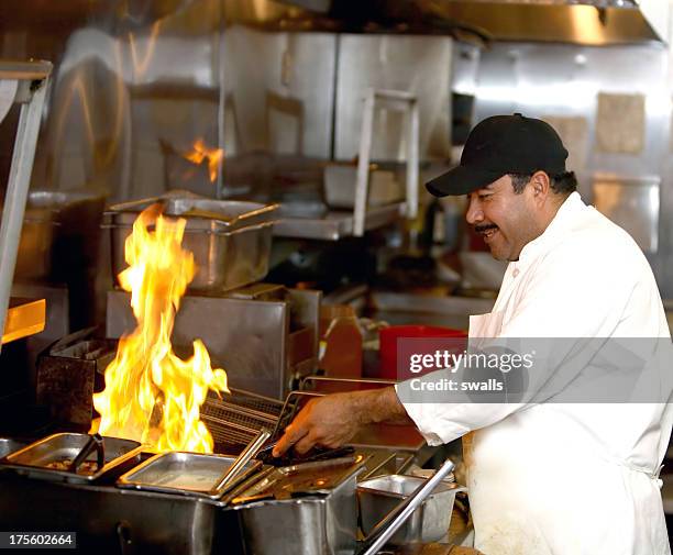 cook - chef coat stock pictures, royalty-free photos & images
