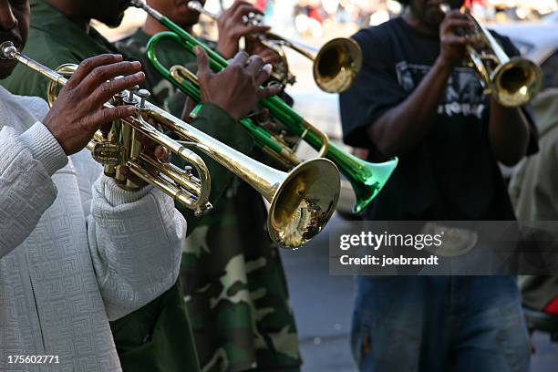 street jazz band trumpet quartet - wind instrument stock pictures, royalty-free photos & images