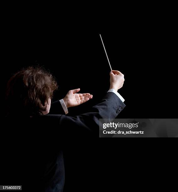 musical conductor - music conductor stock pictures, royalty-free photos & images