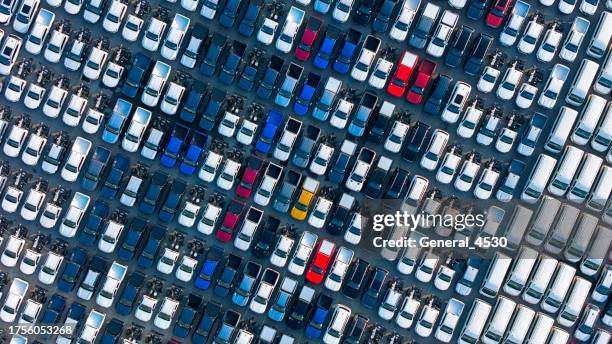 aerial top view cars lined up in a row in a pattern for logistics. - nissan stock pictures, royalty-free photos & images