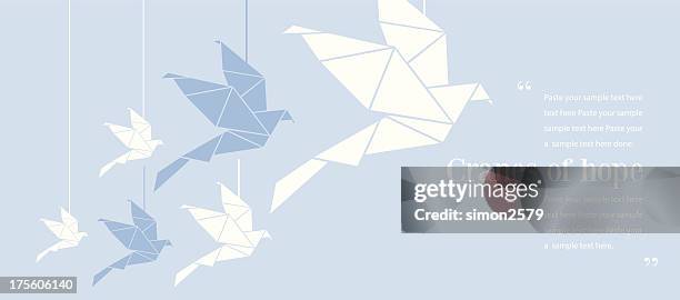 origami of cranes and how they represent hope - origami stock illustrations