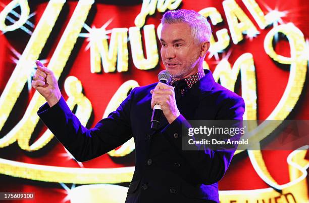 Baz Luhrmann addresses the media during the photo call for 'Strictly Ballroom The Musical' at Town Hall on August 5, 2013 in Sydney, Australia.