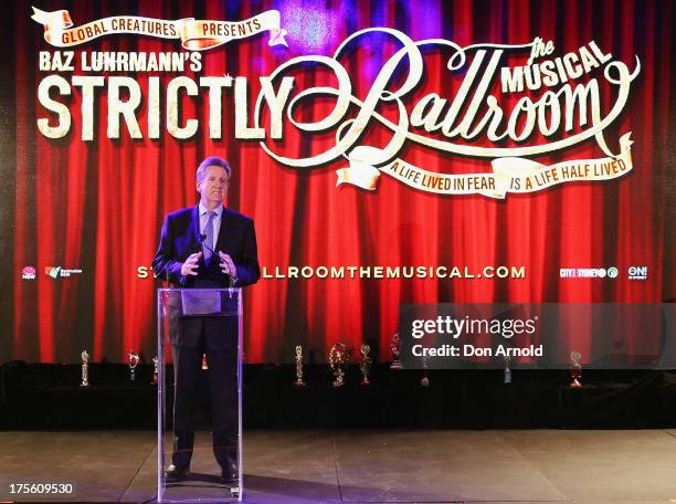 Barry O'Farrell addresses the media during the photo call for 'Strictly Ballroom The Musical' at Town Hall on August 5, 2013 in Sydney, Australia.