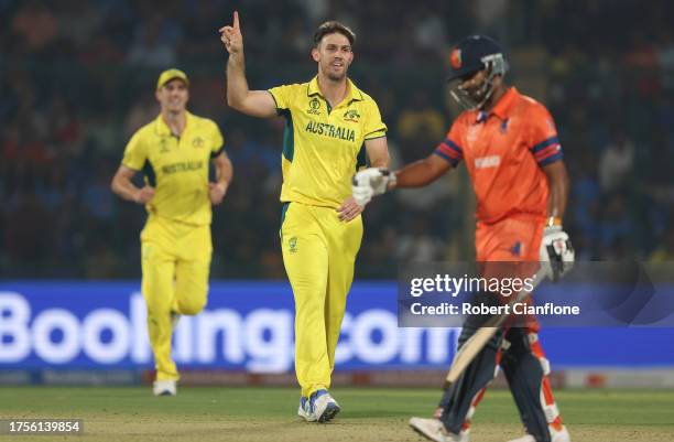 Mitch Marsh of Australia celebrates the wicket of Teja Nidamanuru of Netherlands during the ICC Men's Cricket World Cup India 2023 between Australia...