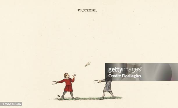 Medieval children's game of badminton with racquets and shuttlecock, 13th century. Handcoloured lithograph by Joseph Strutt from his own Sports and...