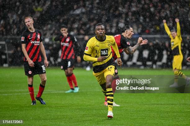 Youssoufa Moukoko of Borussia Dortmund celebrates after scoring his team's second goal during the Bundesliga match between Eintracht Frankfurt and...