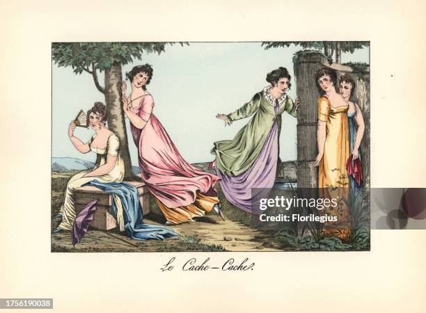 Elegant women playing hide and seek, cache-cache, in a garden. From Pierre de la Mesangere's Bon Genre, 1817. Handcoloured lithograph from Henry Rene...