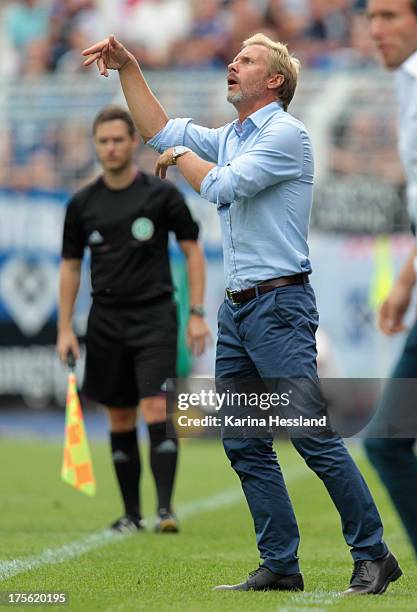 Head Coach Thorsten Fink of Hamburg reacts during the DFB Cup between SV Schott Jena and Hamburger SV at Ernst-Abbe-Sportfeld on August 04, 2013 in...