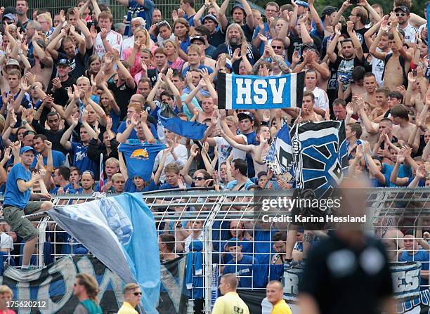 Fans of Hamburg during the DFB Cup between SV Schott Jena and Hamburger SV at Ernst-Abbe-Sportfeld on August 04, 2013 in Jena,Germany.